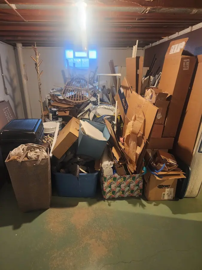 Roll-off dumpster container at job site for 4 Yard Dumpster Rental in Allenstown